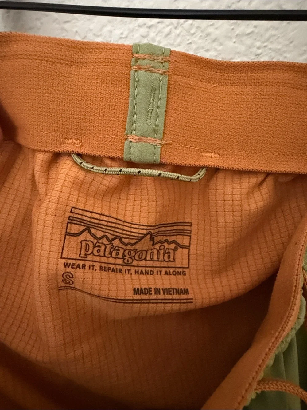 Patagonia Olive Green Athletic Shorts with Orange Accent